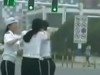 В Китае сотрудницы автоинспекции подрались прямо на перекрестке